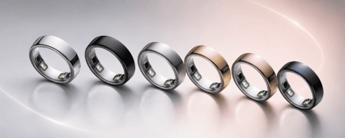 Six metallic rings with small internal LEDs, arranged in a row from silver to dark blue on a glossy surface.